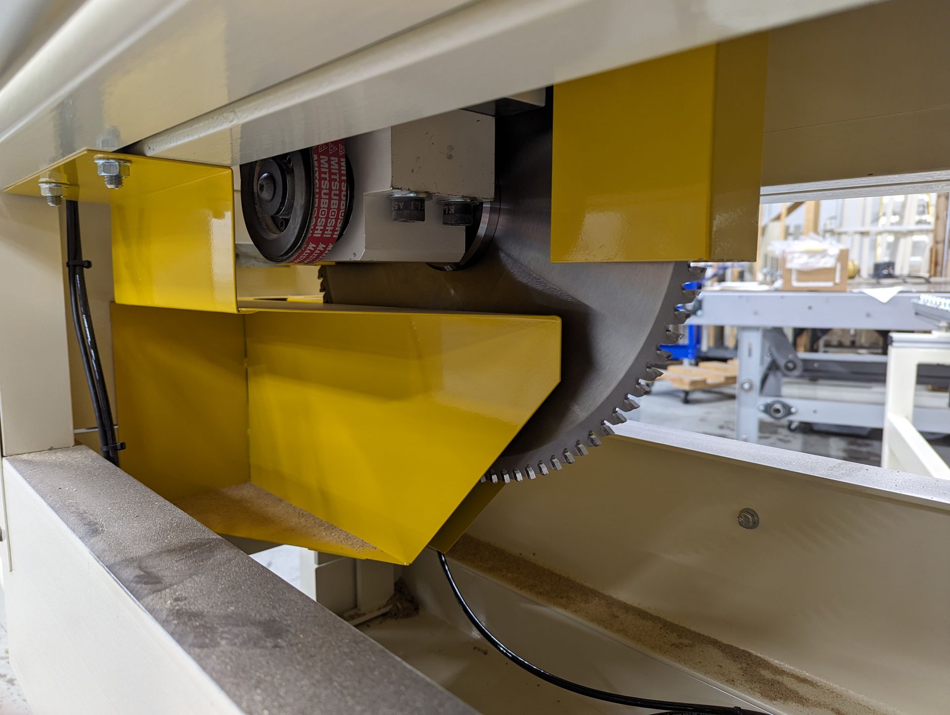 Evans Midwest miter saw and cutting station trimming a completed post-form countertop to length